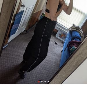 Black Nike track pants